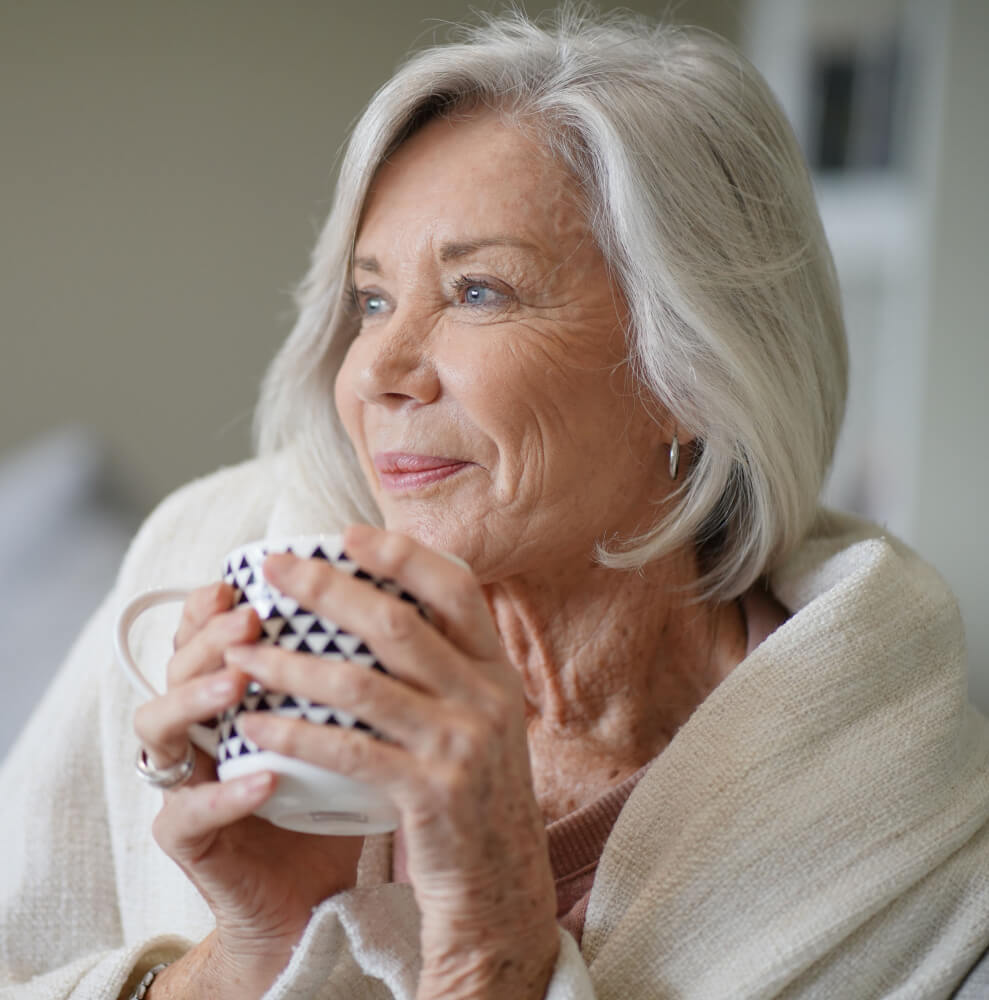 Afbeelding Vrouw met kop koffie